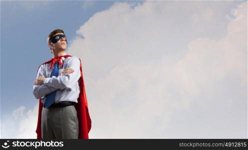 Young man in superhero costume representing creativity concept. Creativity is what I am god at