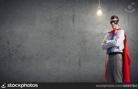 Young man in superhero costume representing creativity concept. Creativity is what I am god at