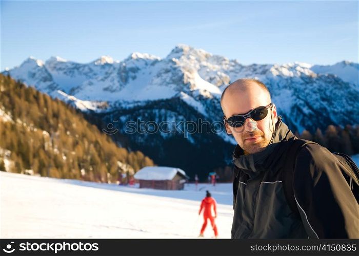 Young Man In The Alps Mountains. Winter Sport Series.