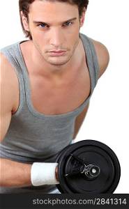 young man lifting weights