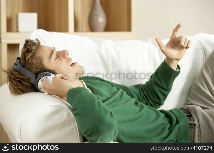 Young Man Listening To Music