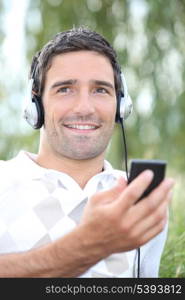 Young man listening to music