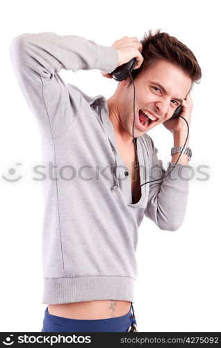 Young man listening to music - isolated