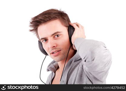 Young man listening to music - isolated