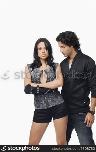 Young man looking at a young woman