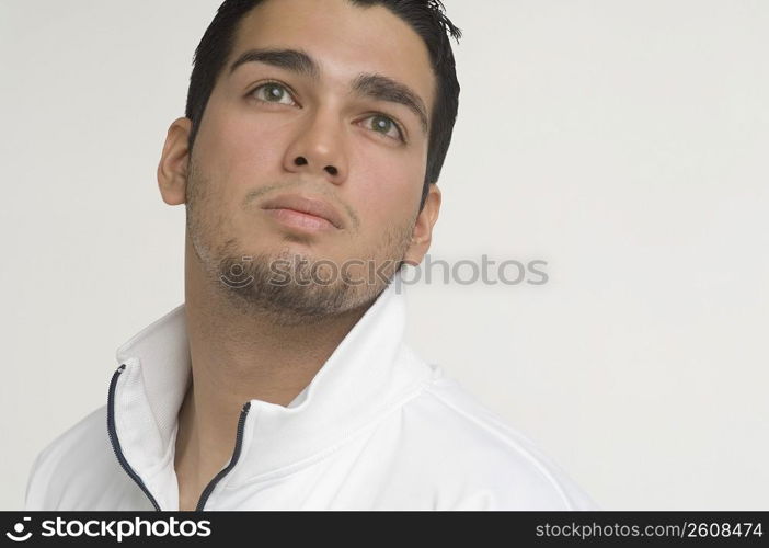 Young man looking up