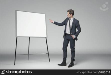 Young man making a lecture about business