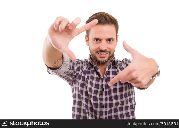 Young man making framing key gesture - isolated over white