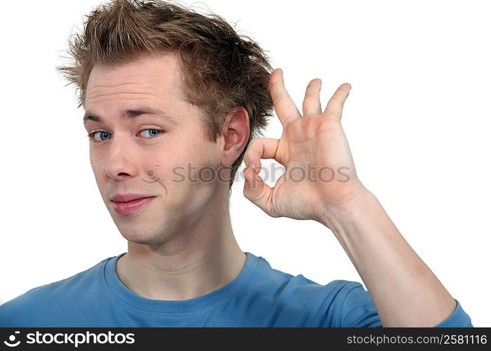 young man making okay sign