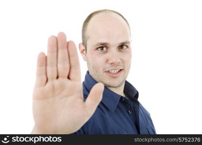 young man making stop with his hand, isolated