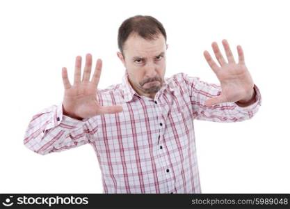 young man making stop with his hands, isolated