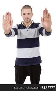 young man making stop with his hands, isolated