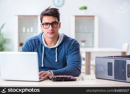 Young man mining bitcoins at home