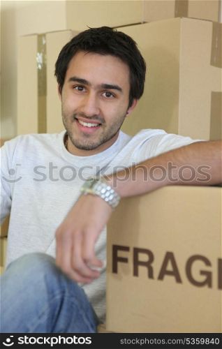 young man moving into a new apartment