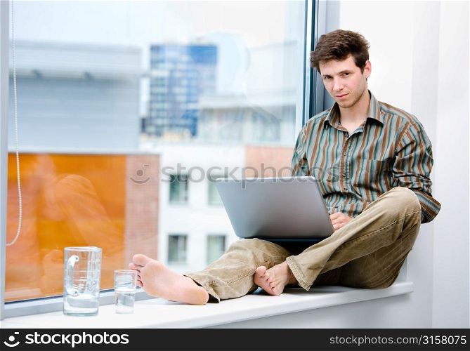 Young man on a laptop