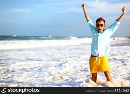 young man on vacation happiness in water