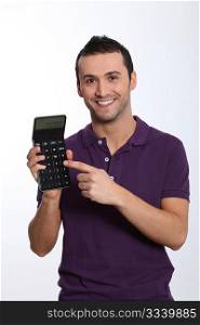 Young man on white background holding calculator