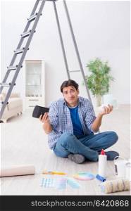 Young man overspending his budget in refurbishment project