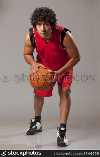 Young man playing basket ball