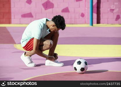 young man playing football 18