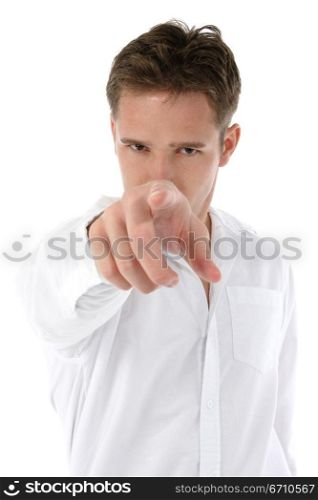 Young man pointing forward with his index finger