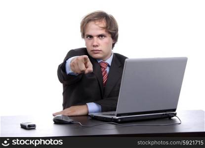 young man pointing wile working with laptop