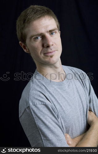 young man portrait, on a black background