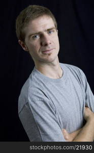 young man portrait, on a black background