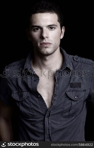 young man portrait, on a black background