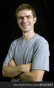 young man portrait, on a black background