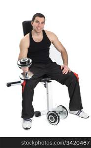 young man posing with dumbbells sitting on bench, on white background