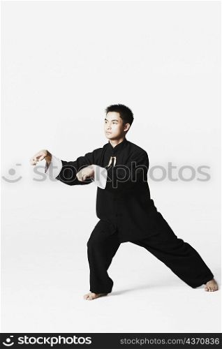Young man practicing martial arts