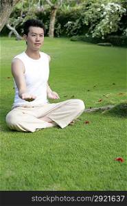 Young man practising Qigong