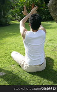 Young man practising Qigong