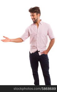 Young man presenting your product, isolated over a white background