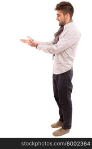 Young man presenting your product, isolated over a white background