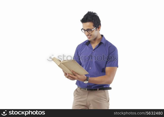 Young man reading a book