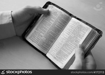 Young man reading bible