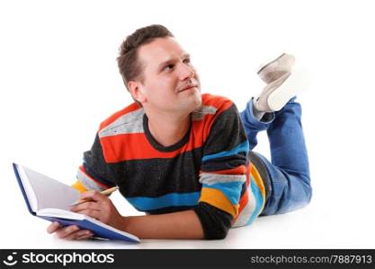 young man reading or studying on the floor full length isolated on white