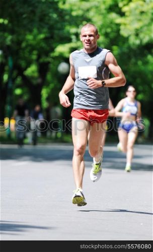 young man run marathon and recreating fitness sport