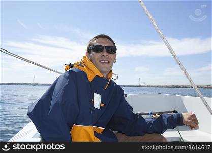 Young man sailing
