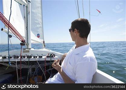 Young man sailing