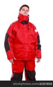 Young man sailor wearing red waterproof wind jacket isolated on white. Sailing yachting cruise. Studio shot.