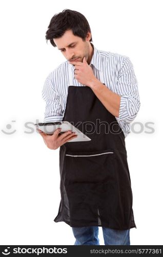 Young man searching for a new recipe over the internet