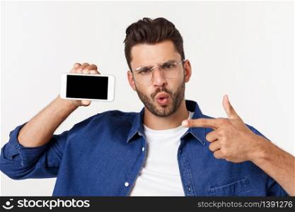 Young man showing his brand new smart phone isolated on white. Young man showing his brand new smart phone isolated on white.