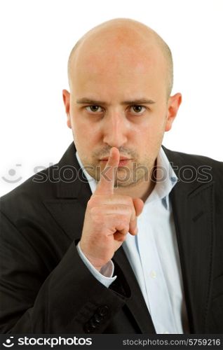 young man showing silence gesture with his finger in the mouth