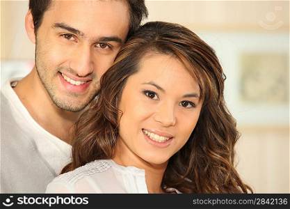 Young man smiling and Asian girl