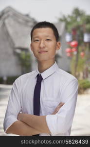 Young Man smiling and looking at camera