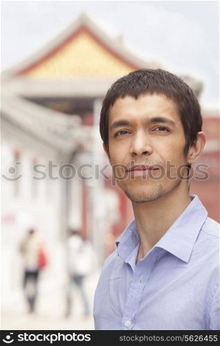 Young Man smiling and looking at camera