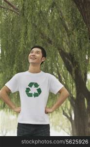 Young Man Smiling, Recycling Symbol, Beijing